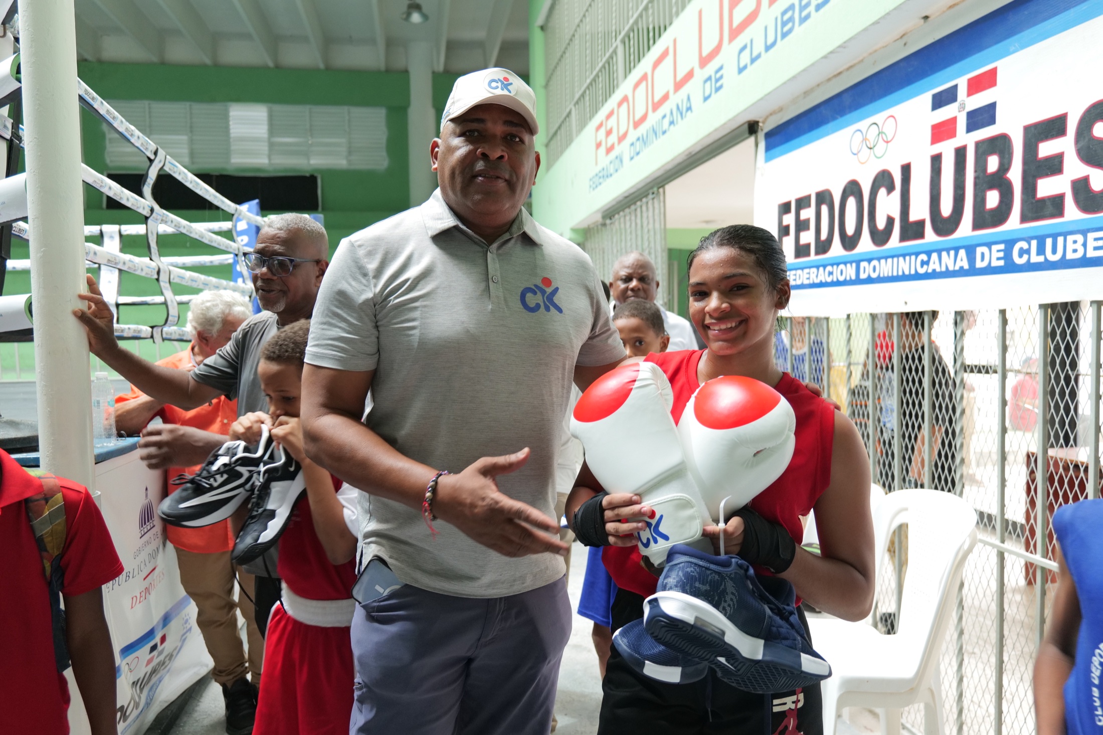 A young boxer receiving support at a Children’s Kingdom Foundation event