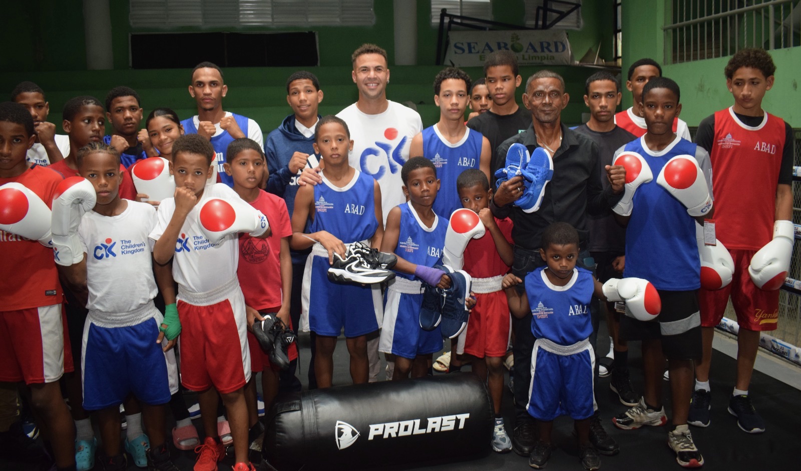 Young boxers and mentors gathered at a Children’s Kingdom Foundation boxing event