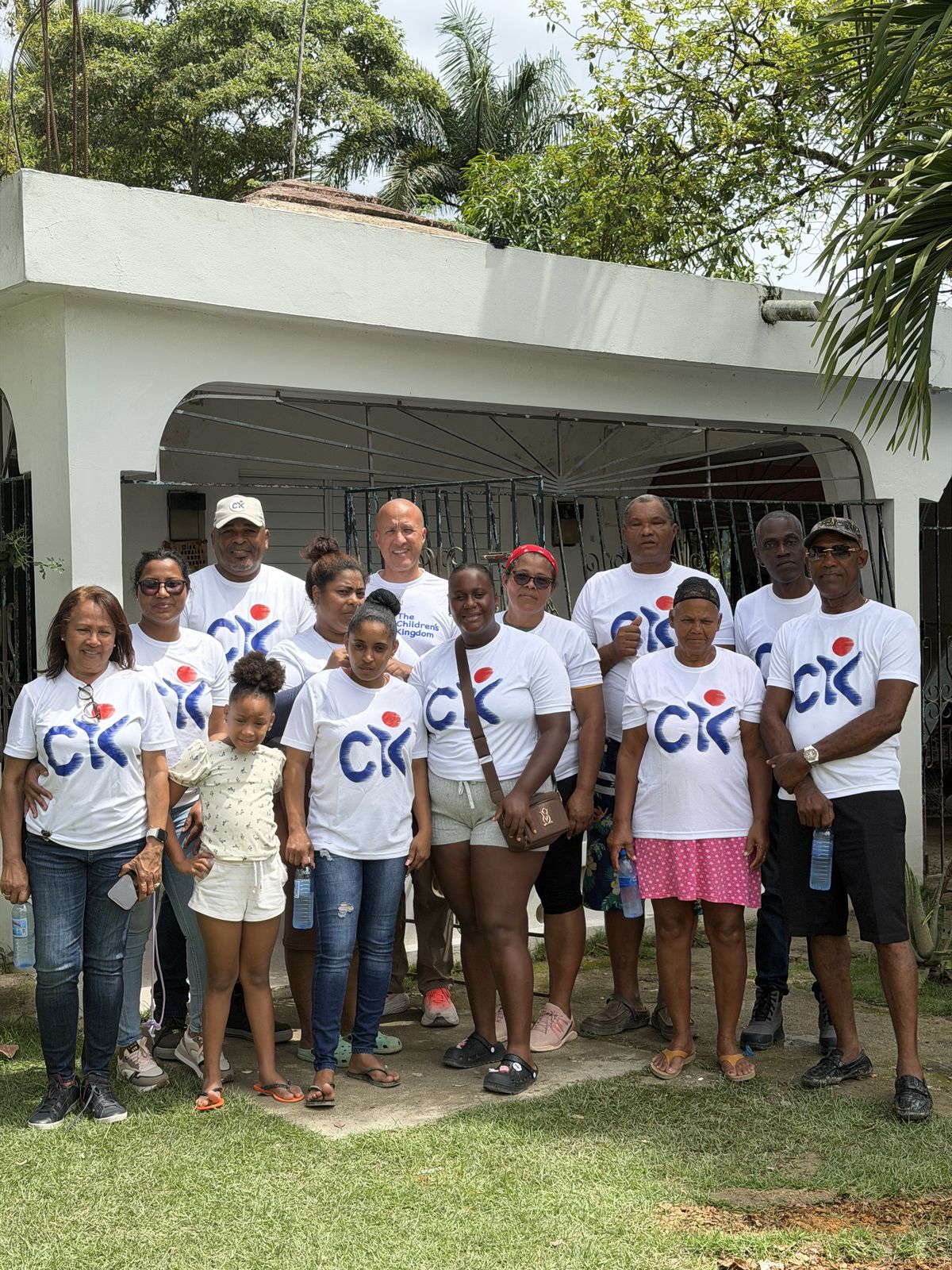 TCKF volunteers and children gathered together at a community event in Montellano